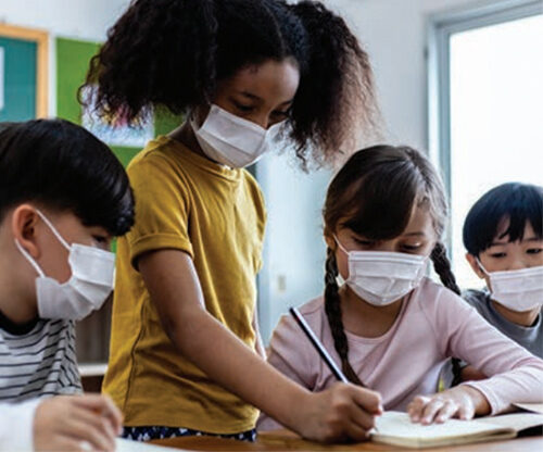 Children working in masks